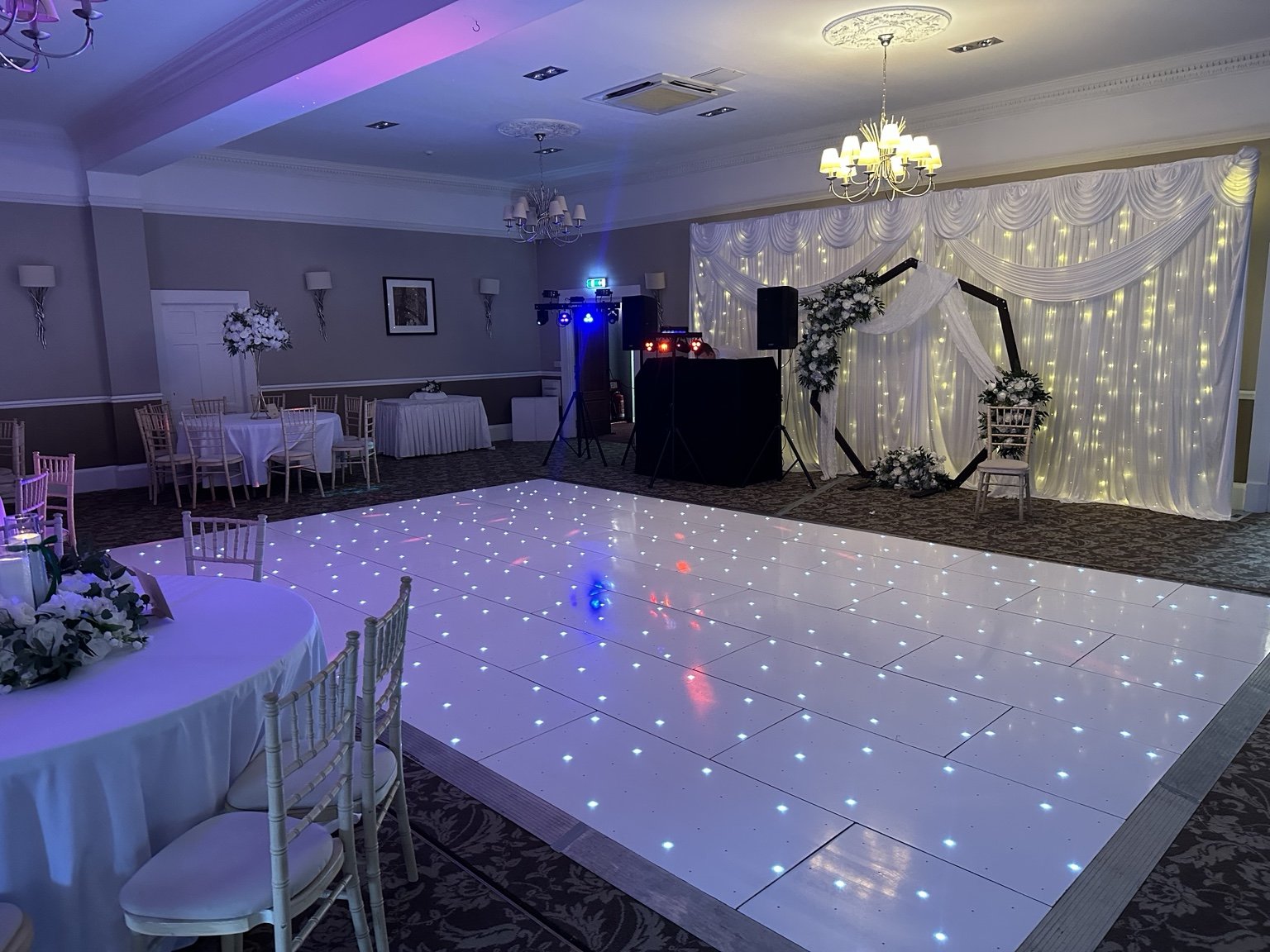 White LED dance floor prepared for a Scottish wedding reception