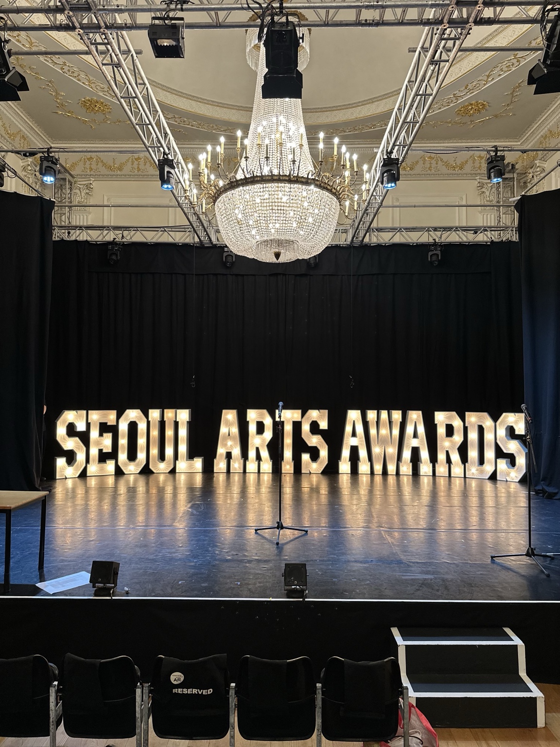 Large illuminated letters at a luxury awards event