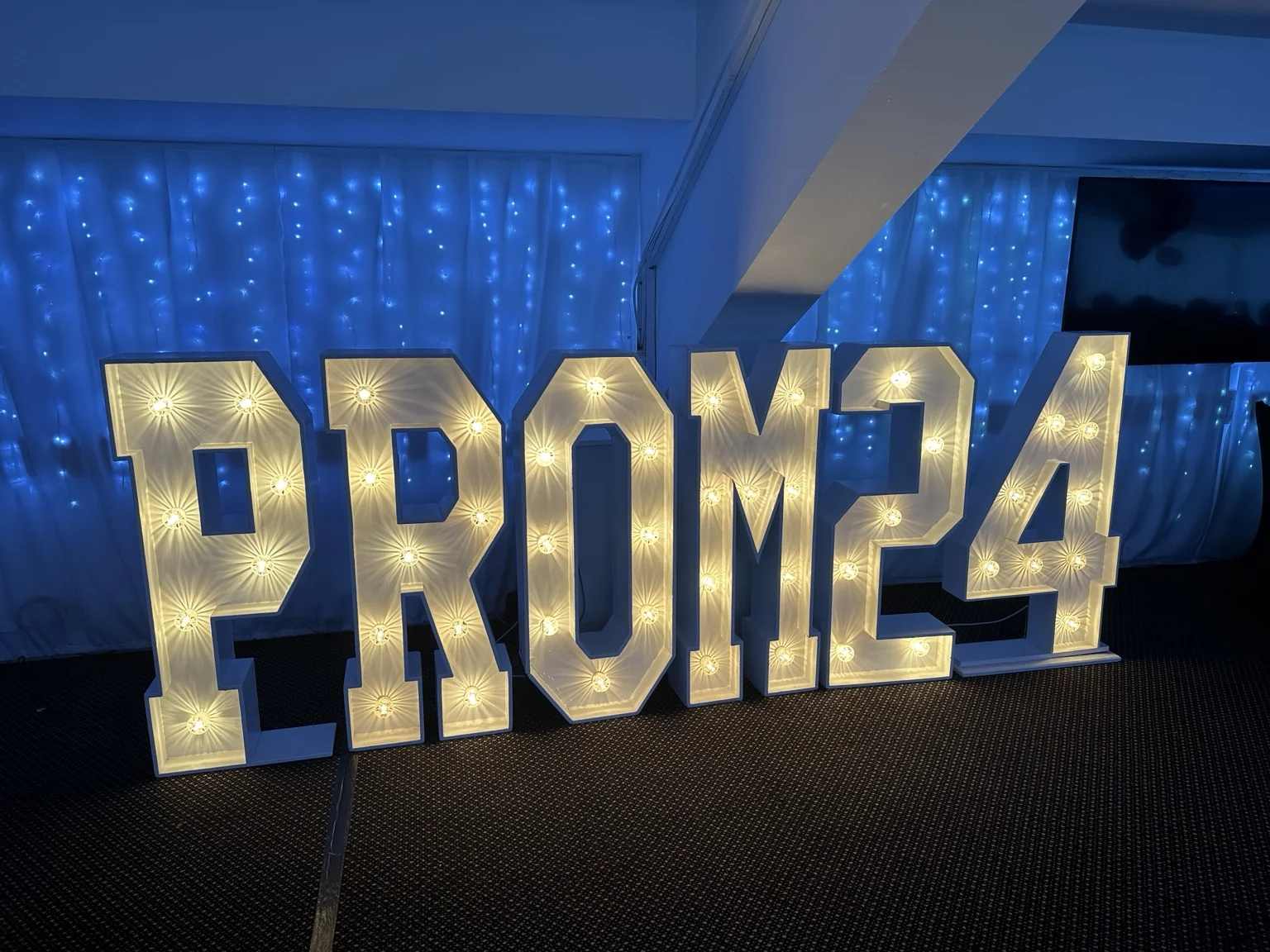 Large illuminated PROM24 letters at a Scottish prom celebration
