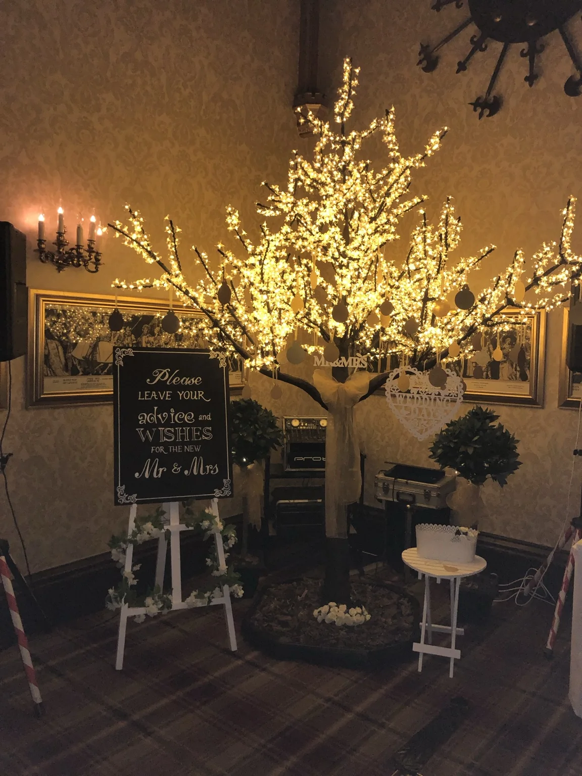 Wedding room detail and illuminated decorative tree at Dalhousie Castle