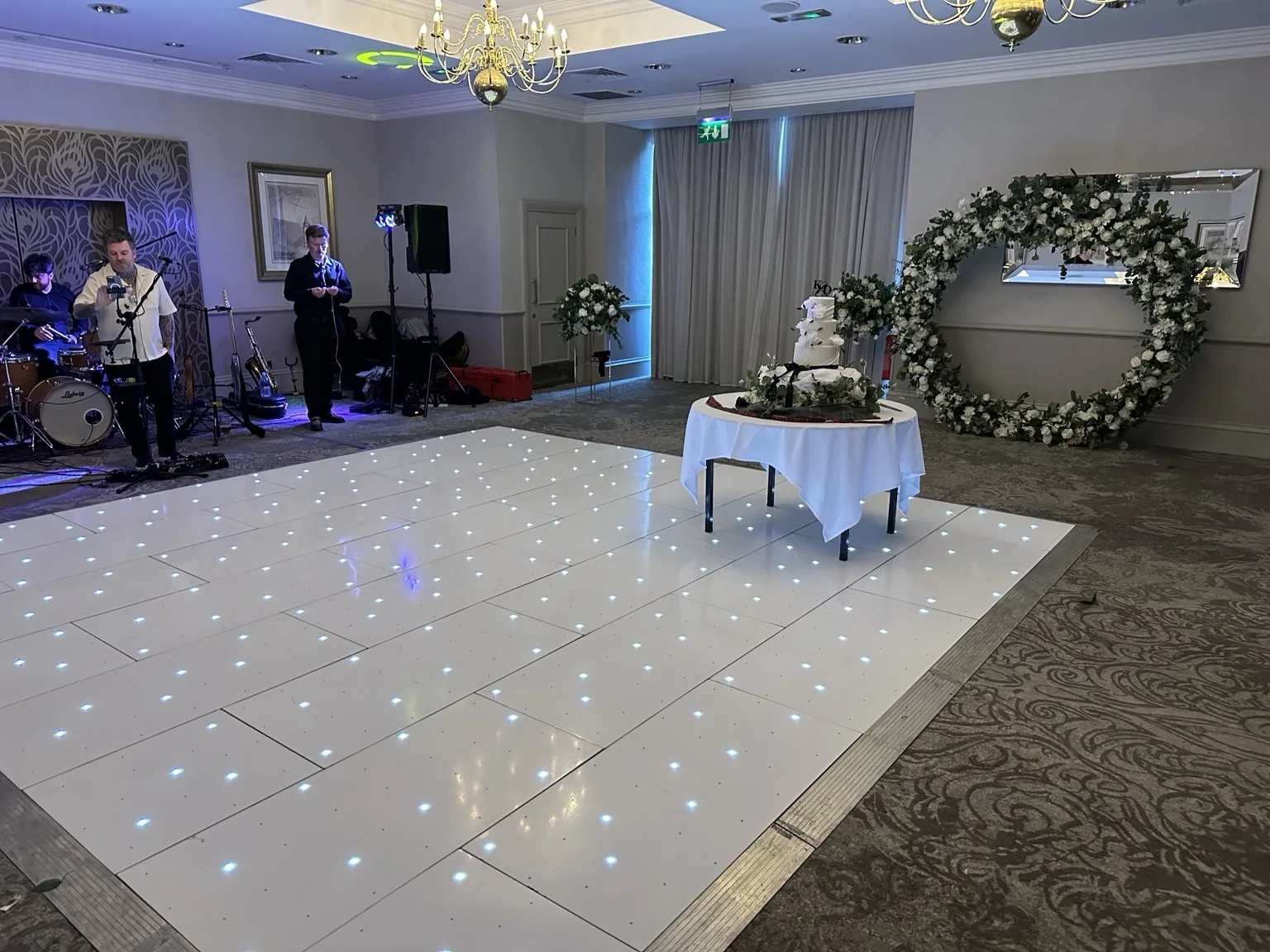 Smaller rectangular white starlit LED dance floor inside Edinburgh Zoo Mansion House