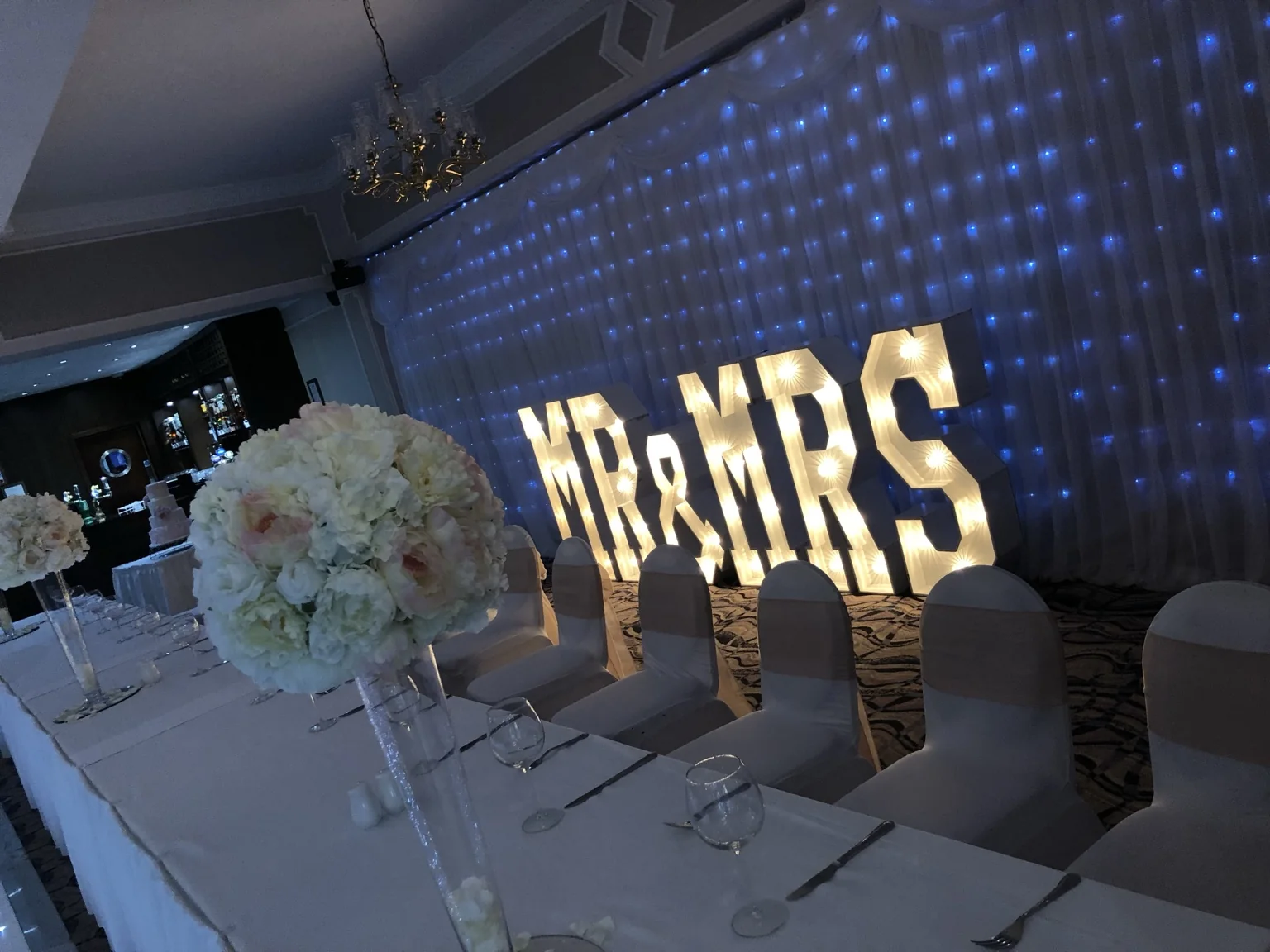 White starlit LED dance floor and illuminated wedding letters at The Hilcroft Hotel in Whitburn