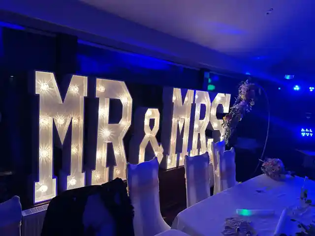 Illuminated MR and MRS wedding letters installed by Instapic inside Kings Acre Golf Club in Lasswade
