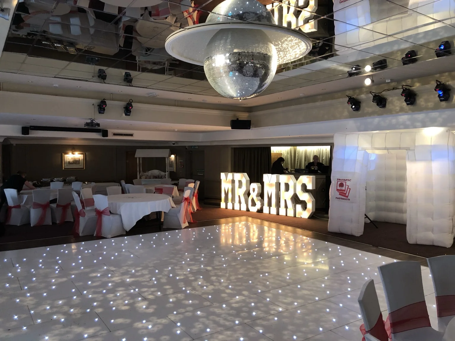 White starlit LED dance floor, illuminated letters and Instapic photo booth at The Redhurst Hotel
