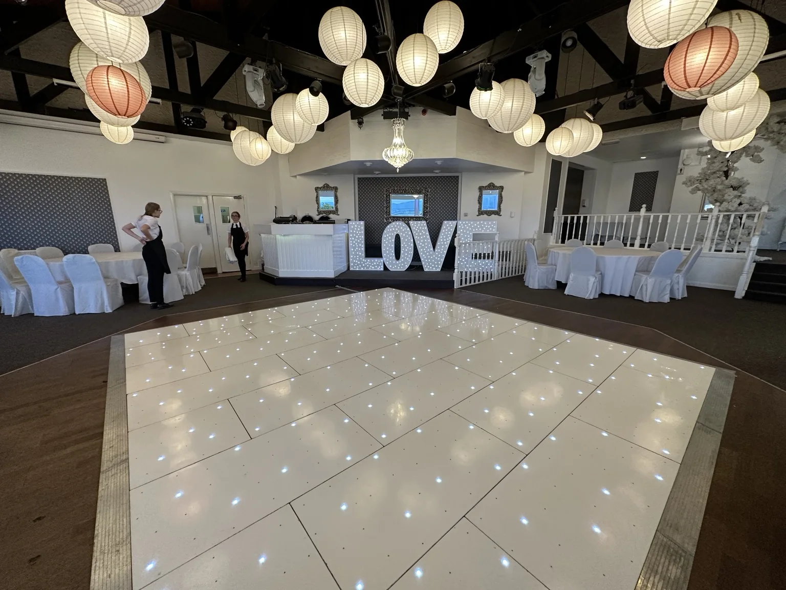 Wide wedding room view with LOVE letters and starlit dance floor at The Three Kings Falkirk